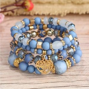 New 4 piece beaded bracelet heart charm